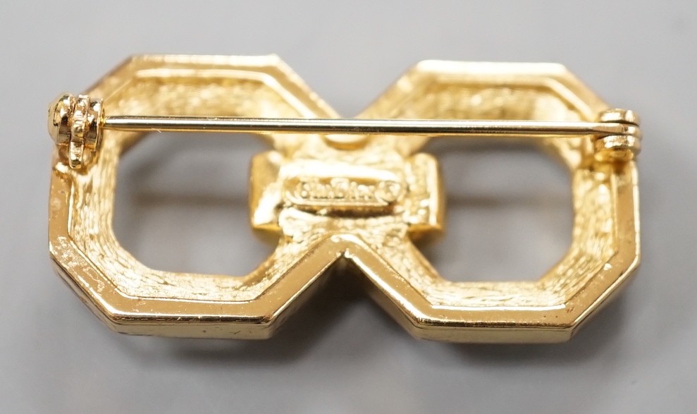 A Christian Dior gilt metal and paste set costume set double octagon brooch, 34mm.